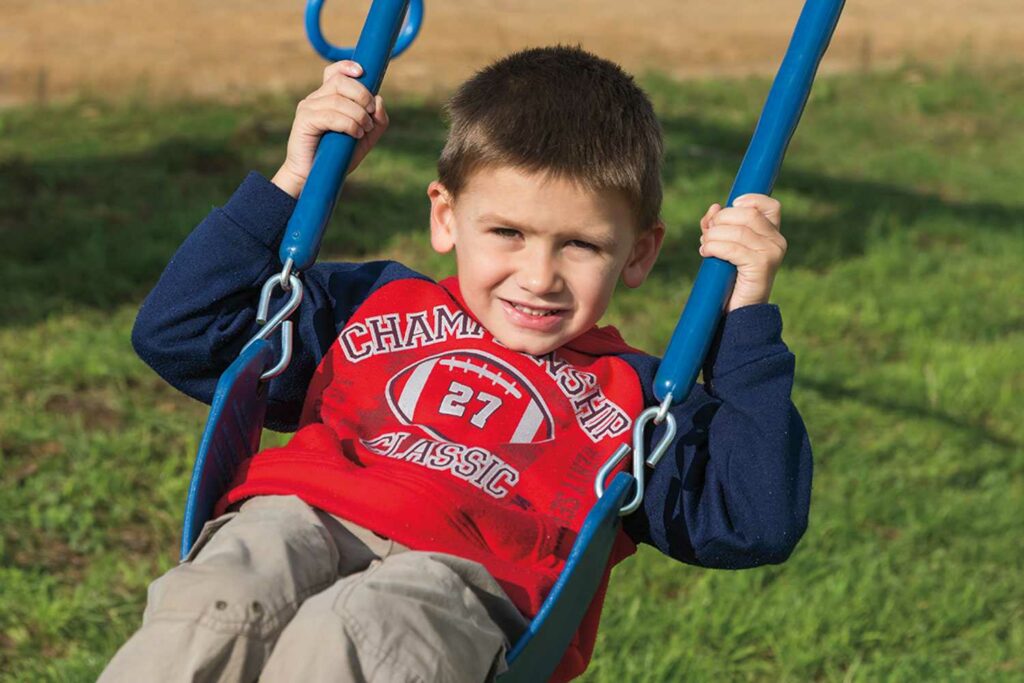 A child swinging on a swing