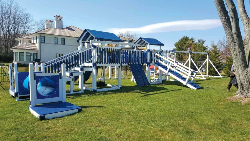 A large blue and white swingset
