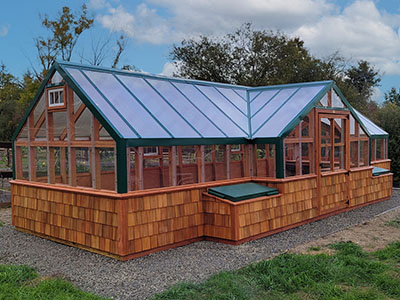 Commercial Greenhouse with cedar shake shingles around base