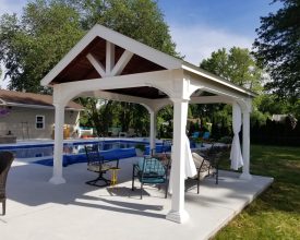 Custom A frame 12'x14' vinyl poolside pavilion with square posts.