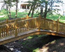 Wooden backyard bridge over gully