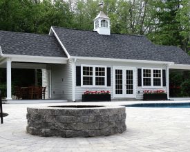 This large poolhouse features double porch areas, and is finished out inside with T & G board, and has electrical.