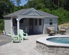 This pool house has storage area plus changing room and full bar sitting area.