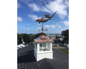 Vinyl cupola with copper hip roof and fixed glass windows with weathervane.