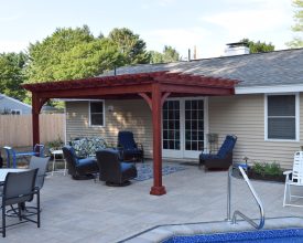 12x16 Traditional Stained Pergola attached to house. Outdoor wood pergola is stained to match customer preference, attached to the house.