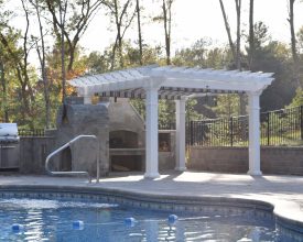 This vinyl pergola is perfect addition to this outdoor kitchen area.