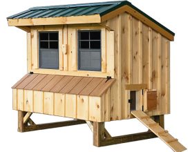 This chicken coop features cedar board and batten siding, metal roof, nesting boxes, and windows.