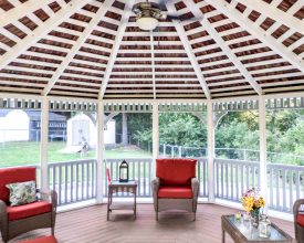 Beautiful gazebo with exposed rafters, electrical package, and screens.