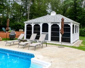 This rectangle gazebo is large with removable screens, hip roof design, and a cupola, makes a beautiful addition to the poolside.