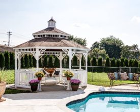 This white octagon gazebo has pagoda design roof with cupola accent, and victorian style trim, perfect addition to any pool area.