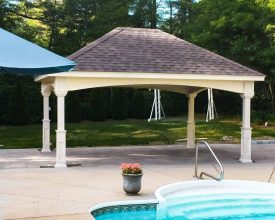 12x18 Hampton Vinyl Pavilion in Ivory next to the pool will add beauty and functionality to this pool area.