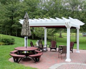 This small patio pergola is beautiful accent to the backyard, and the vinyl construction will last for many years.