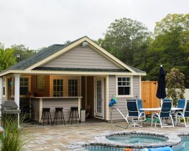 Pool House features outdoor bar area, and changing room with a storage area, plus lots of windows.