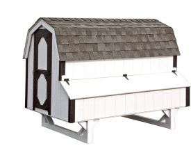 Chicken Coop is built to look like a small barn has nest boxes that are accessed from the outside, and large door on side for cleaning access.