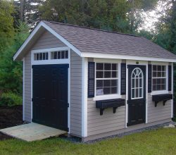 This 10x16 custom storage shed has vinyl siding exterior shingle roof, and personalized doors & windows.