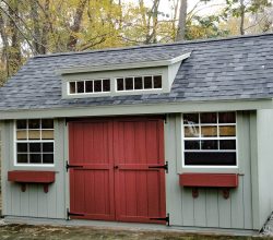This 10x16 unique garden shed features a transom winow dormer, double shed style doors and window boxes.