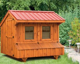 Chicken Coop featuring red metal roof with nest boxes and windows & doors.