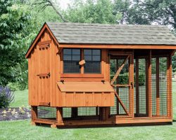 Chicken Coop has a large open air run area with nesting boxes and large access door.