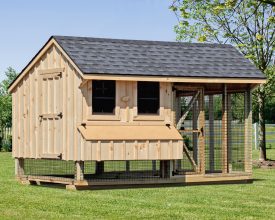 This large chicken house i constructed with board and batten siding and shingled roof plus has a large screened run area.