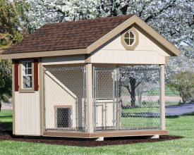 This small dog kennel has windows, chainlink run area, and durable wood construction.