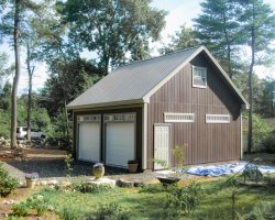 This personalized 24x24 two car garage features painted siding, metal roofing, and upstairs loft area for storage.