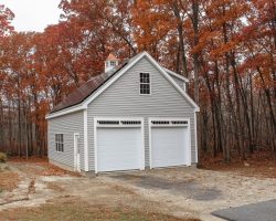 This 2 car garage features second story, transom windows over garage doors, cupola, and lots of storage space.