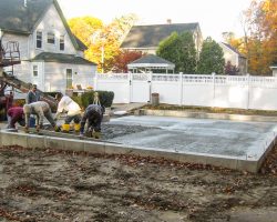 Pouring the floor of the two car Trestle Garage.