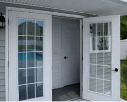 beautiful glass doors in custom pool house