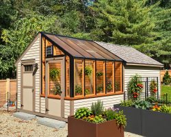 Outdoor Personia beverly shed greenhouse combo in use
