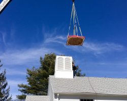 lifting the steeple's roof