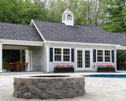 Custom Pool House with Stone Fire Pit