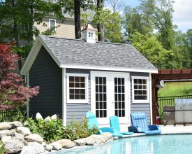 Pool house featuring hardieboard siding, french doors, windows, A frame roof, and a vinyl cupola!