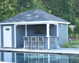 Pool house with a hip roof, single door, and granite countertop!